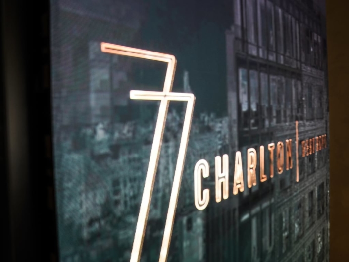 77 Charlton LED Wall by Pixelflex Displaying Gold 77 Charlton Logo