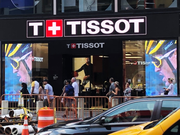 Tissot Transparent LED Window Signage with Cyclist Face